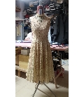 Repairs special vintage clothes. Dresses and clothing repairs customize. Repair on an ancient wedding dress tailoring by hand in Italy custom online